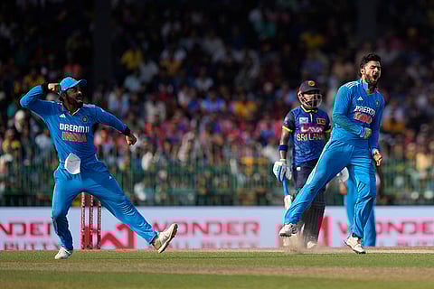 Riyan Parag celebrates the wicket of Sri Lanka's captain Charith Asalanka